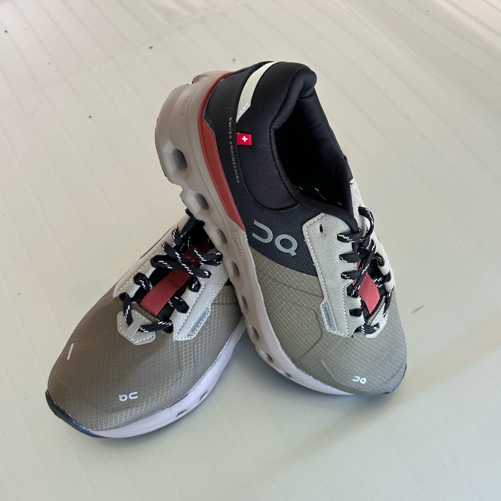 On Running Black and Red Athletic Shoes